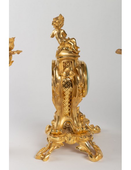 Repisa de chimenea de bronce dorado estilo Luis XV