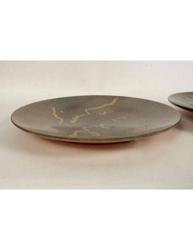 Two ceramic dishes varnished with alan beitner 20th