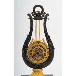 Orologio in bronzo dorato e patinato 2