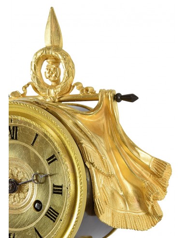 Restoration period clock in gilt bronze.