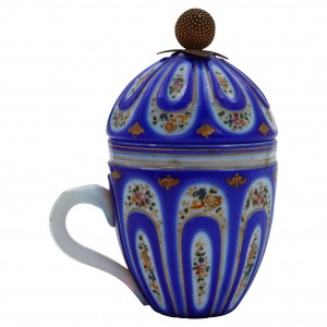 Covered cup in blue and...