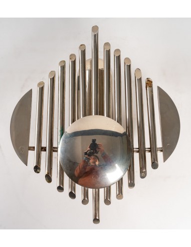 Prototype of chrome-plated metal with futuristic organ motif. electric system at the back of the room.
france, 1970