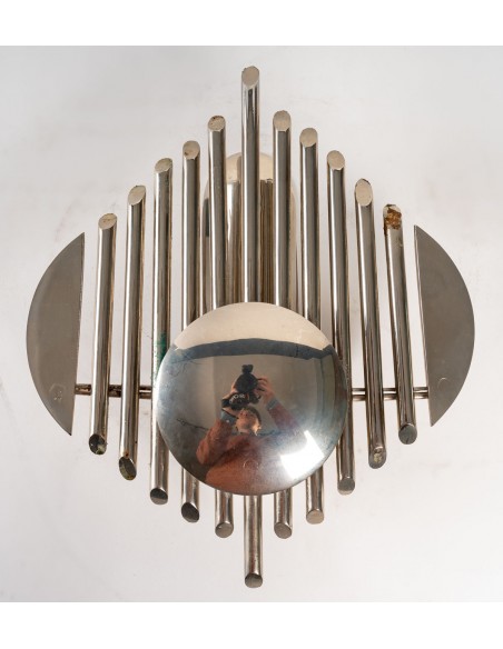 Prototype of chrome-plated metal with futuristic organ motif. electric system at the back of the room.
france, 1970