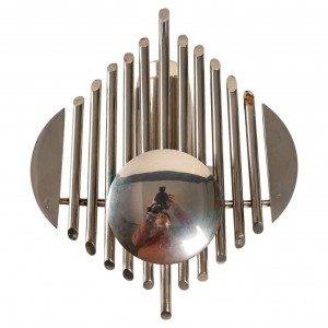 Prototype of chrome-plated metal with futuristic organ motif. electric system at the back of the room.

france, 1970
