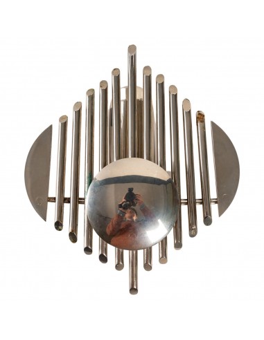 Prototype of chrome-plated metal with futuristic organ motif. electric system at the back of the room.

france, 1970