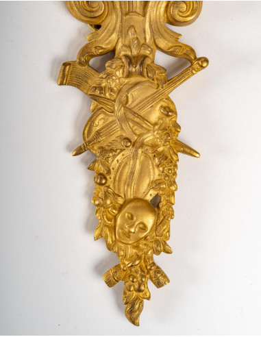 Pareja de apliques de bronce dorado,...