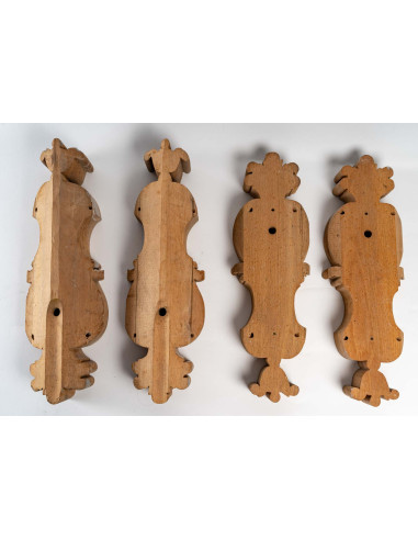 Four brackets for wall lights.
