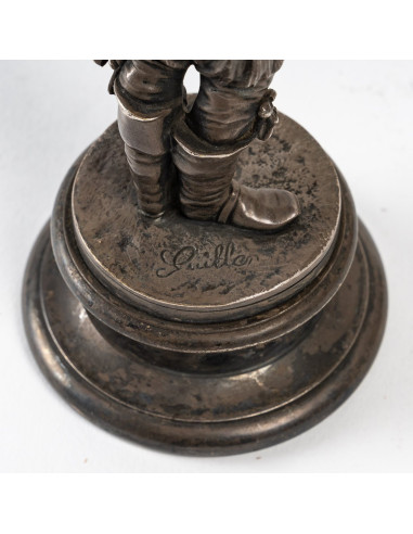 Figura de músico en bronce plateado
