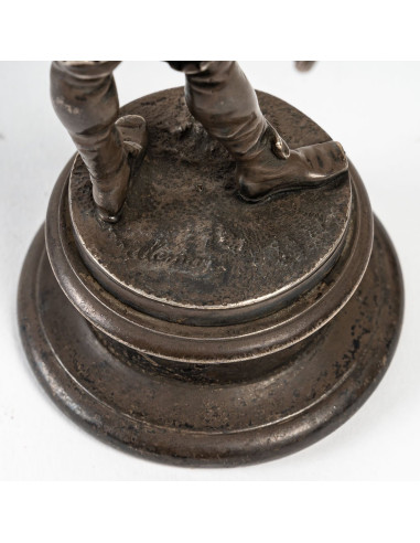 Figura de músico en bronce plateado