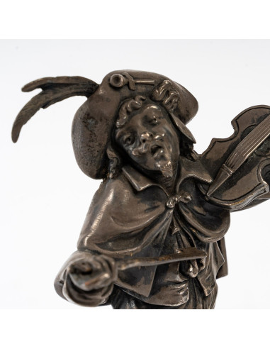 Figura de músico en bronce plateado