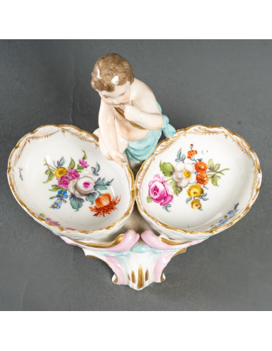 Salero y pimentero de porcelana...