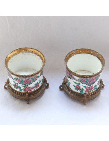 Pair of pot holders for a porcelain...