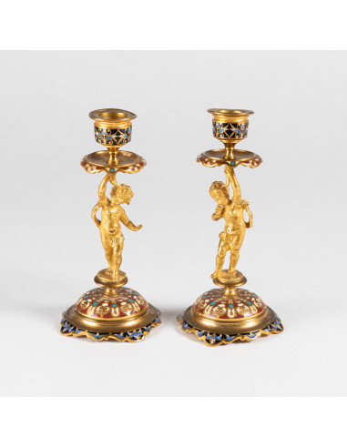 Paire de bougeoirs en bronze doré et...