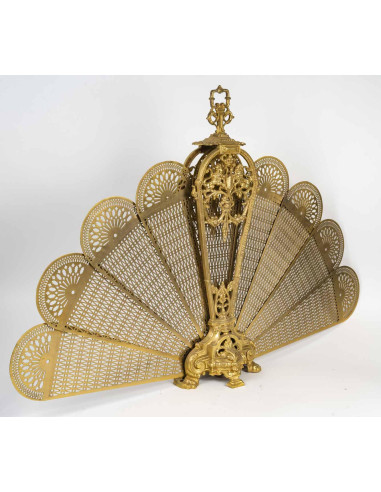 Large ormolu fan-shaped fire screen...