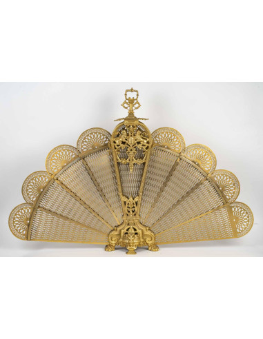 Large ormolu fan-shaped fire screen...