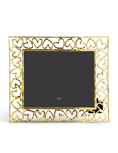 Heart-shaped photo frame in gilded...