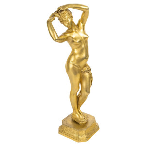Escultura de bronce dorado...