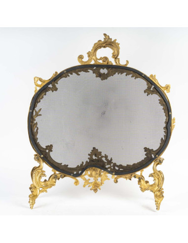 Louis XVI style ormolu fire screen.