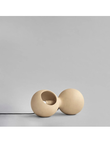 Sand-colored ceramic table or wall...