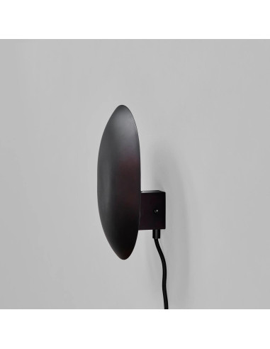 Wall light, made from burnished black...