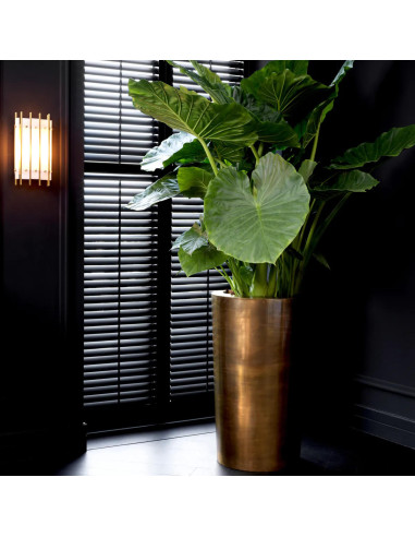 Handcrafted planter in patinated brass.