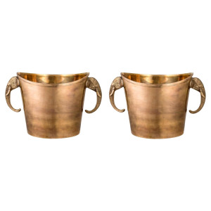 A pair of ice buckets in...