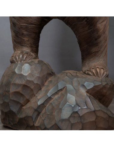 Escultura de madera de mango de un...