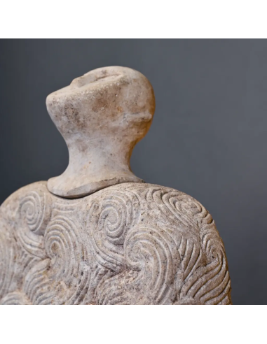 Bacterial idol in sandstone, symbolic...