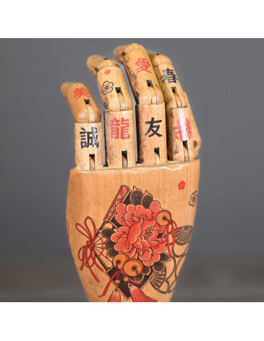 Tattooed wooden arm