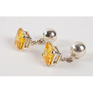 Pair of cuff buttons in solid silver and color zirconium oxide