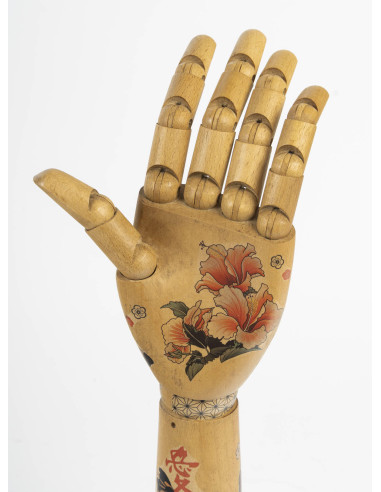 Tattooed mobile arm, 20th century.