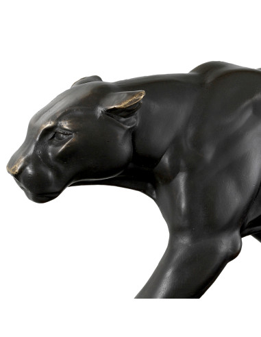 Bronze panther sculpture on black...