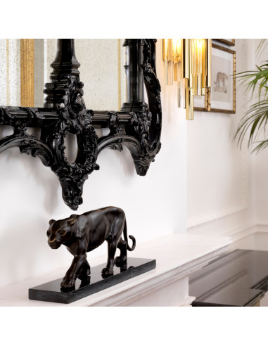 Bronze panther sculpture on black...