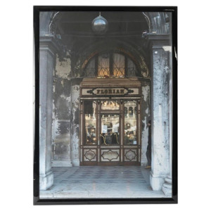 A framed photograph under...