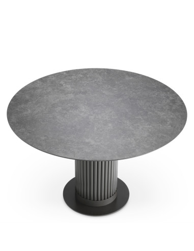 Round dining table with a bronze...