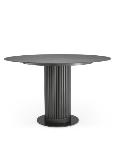 Round dining table in a bronze finish...