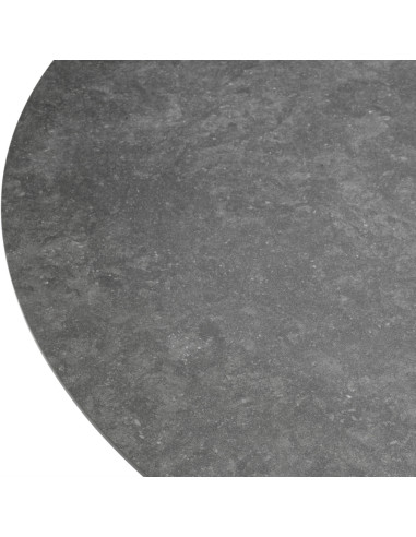 Round dining table with a bronze...