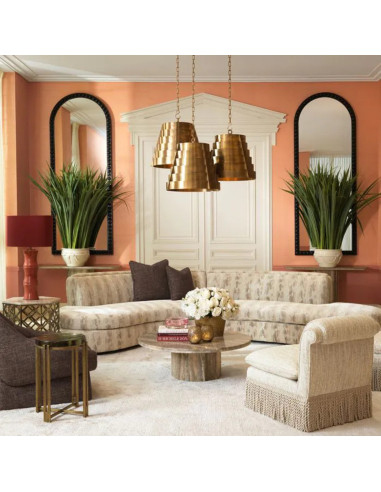 Large circular sofa in sand-colored...