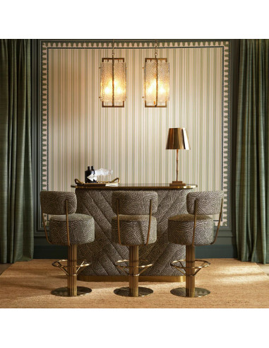 Swivel bar stool with a green...