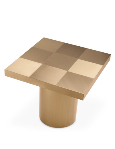 Square side table in a brushed brass...
