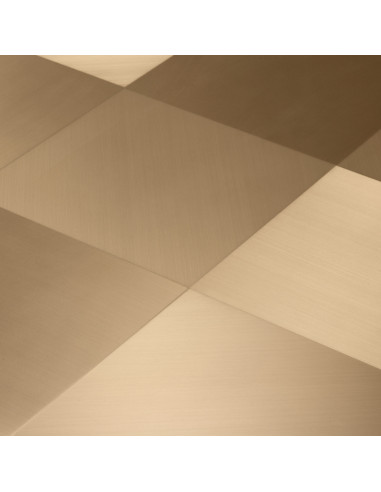 Square side table in a brushed brass...
